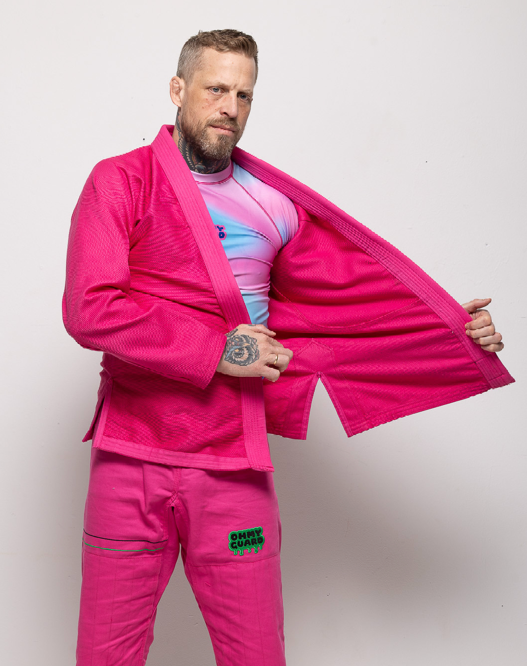 Three woman wearing black, blue and gray kimonos